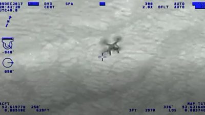 Police helicopter footage of a drone