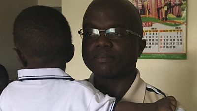Ronald Ngeno with his young son