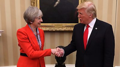 Theresa May and Donald Trump shake hands