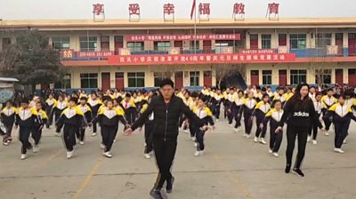 This headteacher in China starts every day with a school 'shuffle' dance