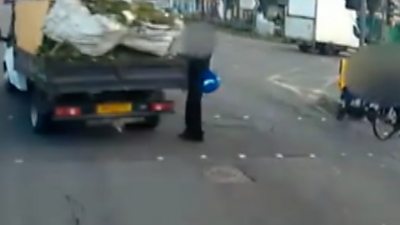 Schoolboy in traffic light near miss