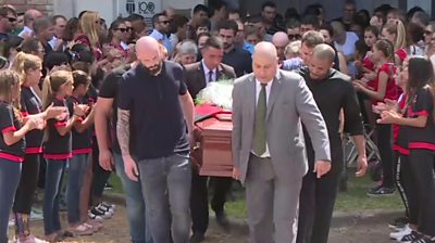 Mourners applaud Sala's coffin