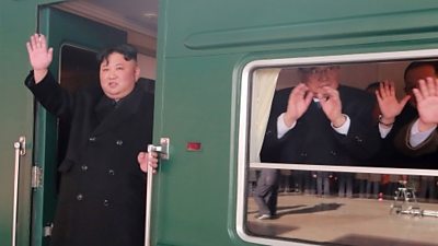 Mr Kim waves from train leaving Pyongyang
