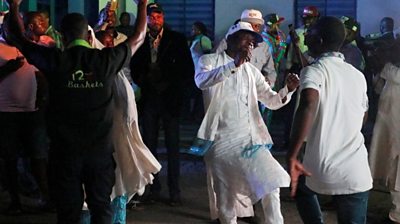 Supporters of Nigeria's President Muhammadu Buhari celebrate in Abuja