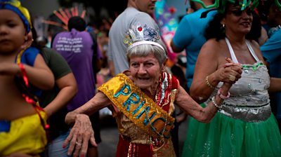 Revellers take part in a street carnival parade of the "Loucura Suburbana" in Rio de Janeiro, Brazil