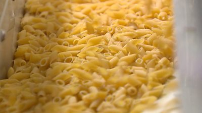 Dried pasta on production line