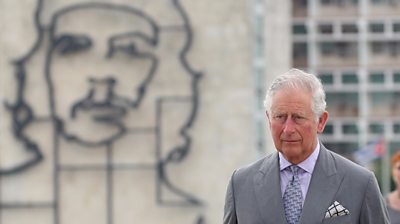 Prince Charles in front of Che mural in Cuba
