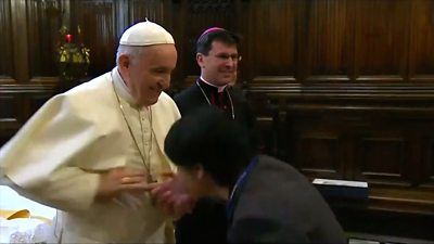 Pope's awkward ring kiss