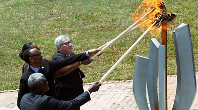 Rwandan president lights flame with others