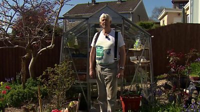 Terry Walton by his greenhouse