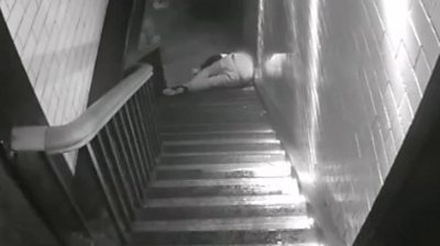This CCTV shows a man being thrown down a flight of stairs in a bar, breaking his back in two places.
