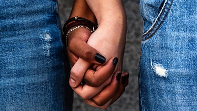 Women holding hands