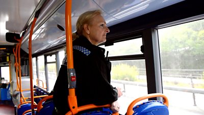 police officer on bus