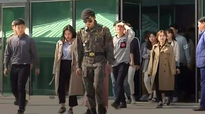 Tourists return from South Korea