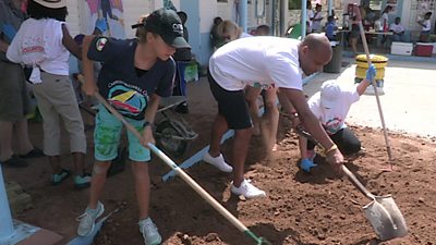 People helping with renovations in St Martin, Caribbean