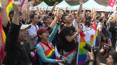 Crowds celebrate in Taiwan as the parliament becomes the first in Asia to pass a same-sex marriage law
