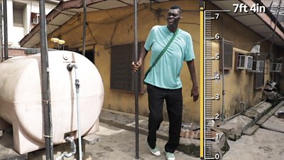 Nigeria's 'giant' on what it's like to be 7ft tall - BBC News