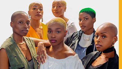 A group of bald black women
