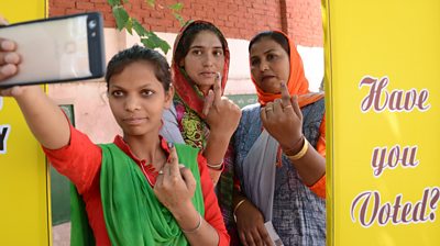 Voters pose for a selfie