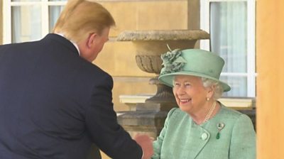 President Trump shakes the Queen's hand