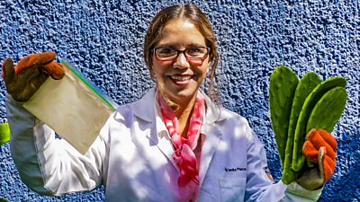 Sandra Pascoe Ortiz holding a bag and cactus leaves