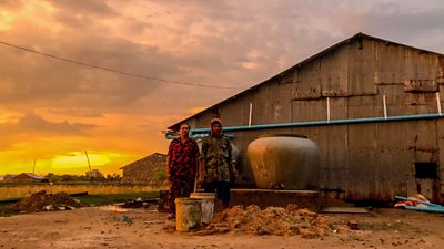 A Cambodian family we supported to build a new fresh water collection system on their roof, as part of our climate TV show Don't Wait For Rain