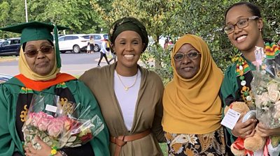 Falhad Ahmed Mohamud (L) and her daughters Sofia (L centre) and Amina (R)