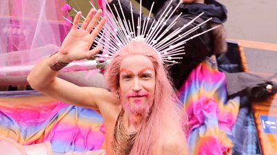 Man wearing spiky head gear