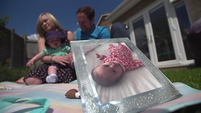 Katie and Ian Picken with a picture of their first child, Seren