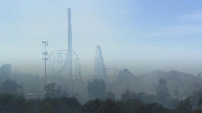 Amusement park clouded by smoke