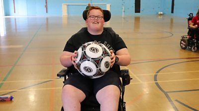 Josh in his powerchair football wheelchair