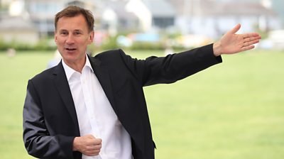 Jeremy Hunt with an outstreched hand
