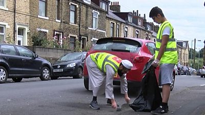 Two people cleaning in Bradford