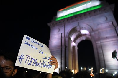 Protesters by India Gate in Delhi, India