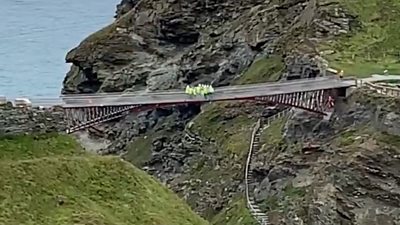 Workers are spotted putting a new bridge to an "unscientific" test