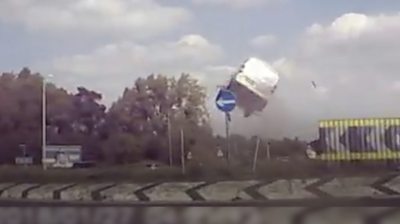 'Flying' van on A11 roundabout