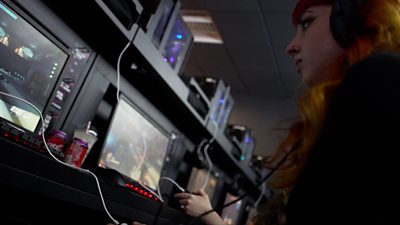 A woman playing a video game