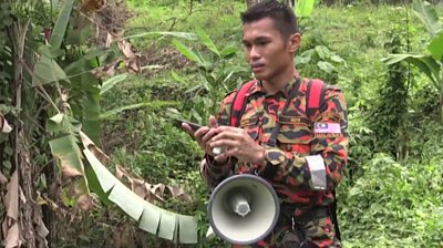 Man with loudspeaker