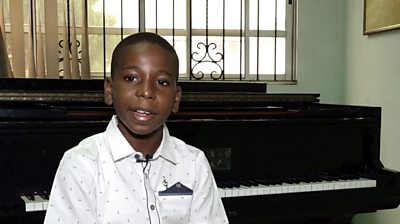 11-year-old piano prodigy Joshua Akinotanhe.