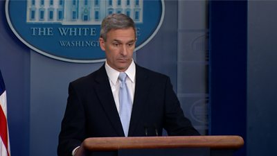 Ken Cuccinelli briefs reporters on a rule that penalises immigrants who need federal assistance.