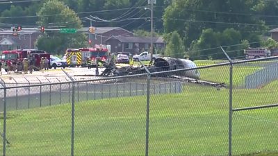The wreckage of a plane that crashed at a Tennesse airport carrying a retired Nascar racer