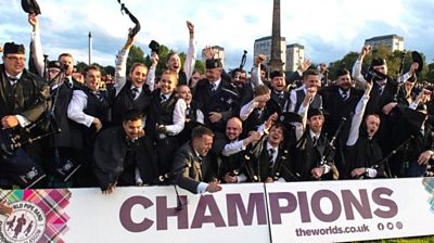 A Scottish pipe band took the title at Glasgow Green after competitors from 13 countries fought for the honour.