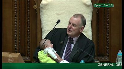 New Zealand's speaker Trevor Mallard cradled an MP's baby during a debate in parliament