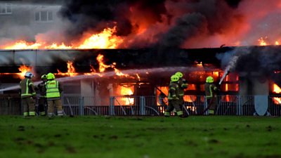 More than 80 firefighters have worked through the night to tackle a "complex" blaze at a secondary school in Fife.