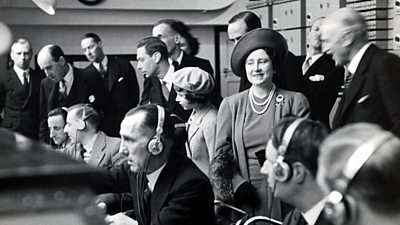 King George VI, Queen Elizabeth, Princess Elizabeth and Princess Margaret inspect the work of various radio technicians at Broadcasting House