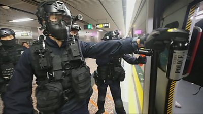 hong kong police storm metro