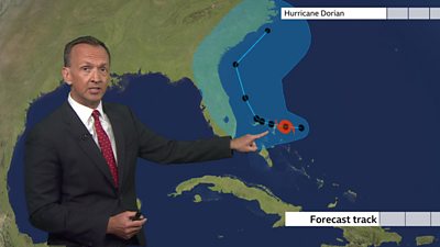 Nick Miller showing the forecast track for Hurricane Dorian
