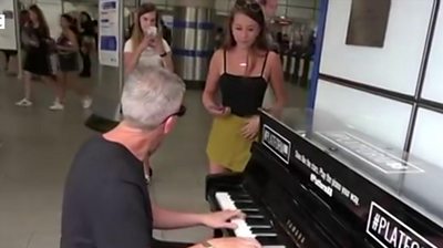 Singer at London tube station