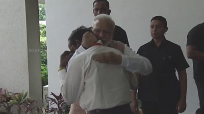 Modi hugs scientist