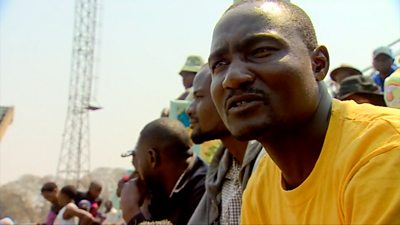 Zimbabwean man in the crowd